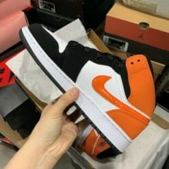 Air Jordan 1 Mid Black Orange Buckled